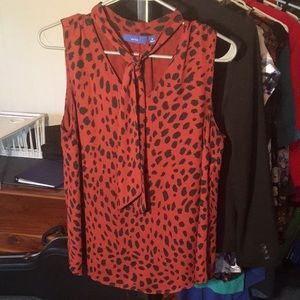 Sleeveless blouse with attached scarf!